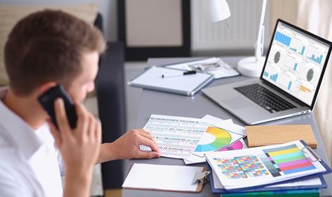 Young business man in office on telematics