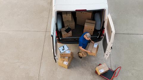 Courier delivering parcel