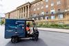 New-electric-cargo-bike-on-the-road-in-front-of-Norwich-City-Hall.-Photography-by-UNP-scaled